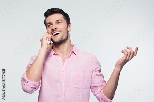 Happy businessman talking on the phone © Drobot Dean