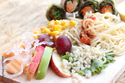 Pasta spaghetti with salad mix fruit and vegetables