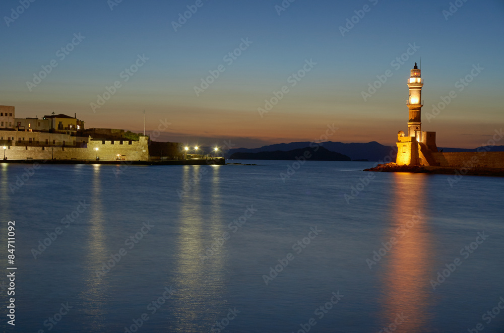 Lighthouse in the old port in the evening, Chania, Crete.