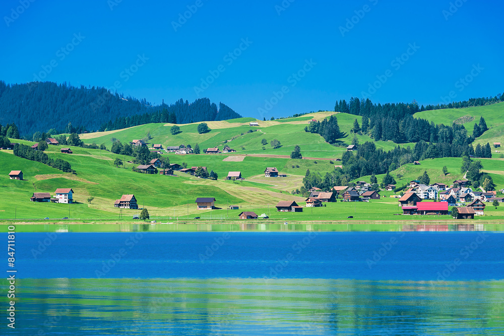 Swiss countryside panorama with lake