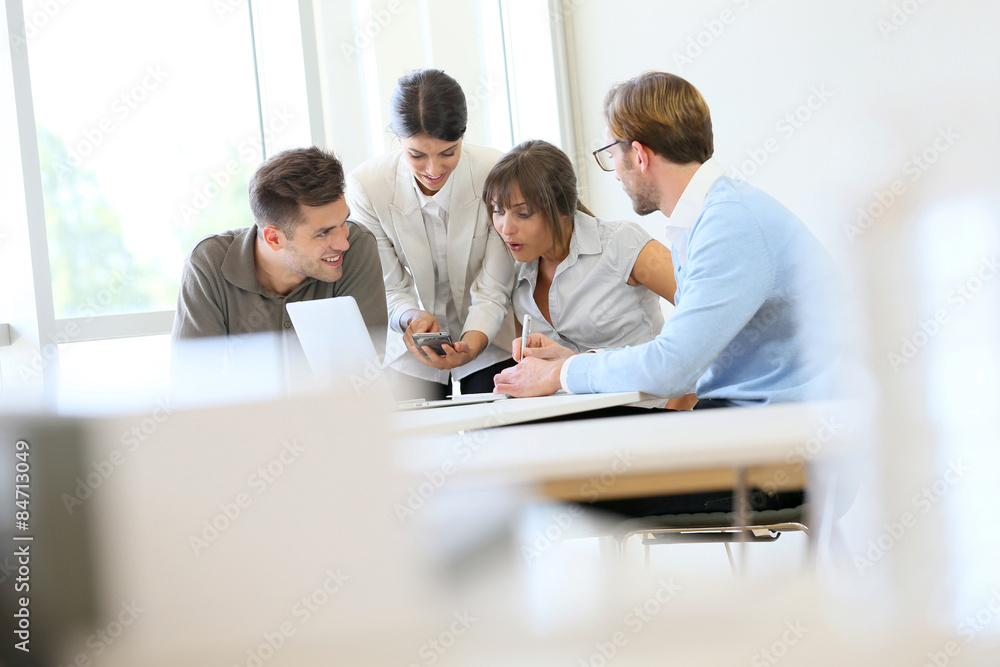 Business people meeting around table