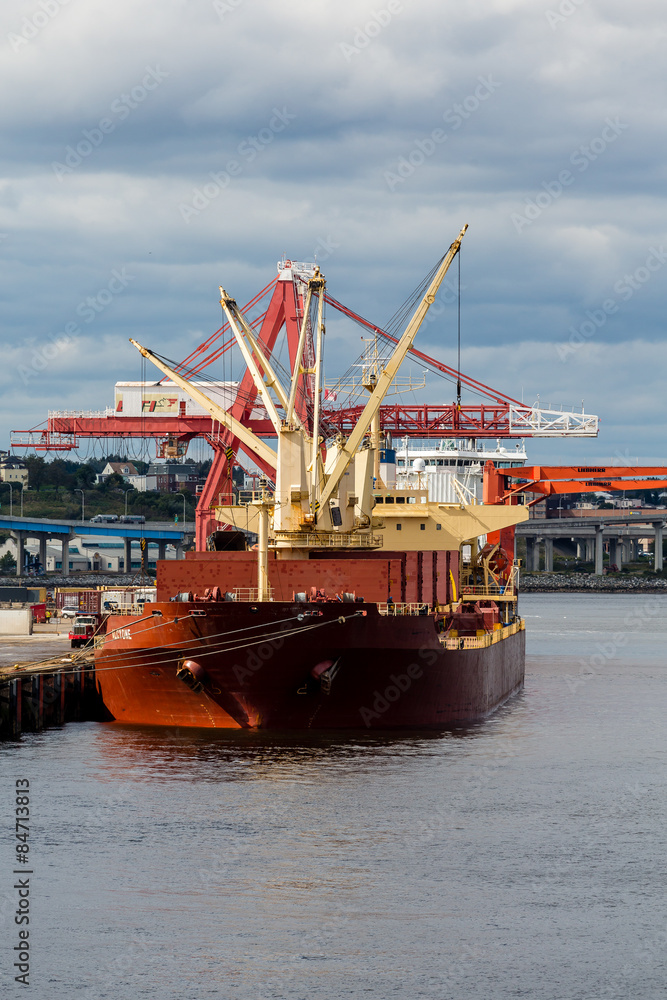 Heavy Red Tanker at Port