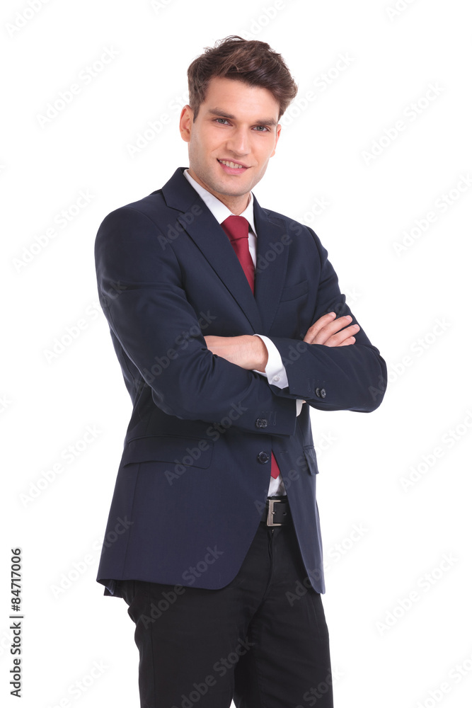 young business man holding his hands crossed. young business man holding his hands crossed.