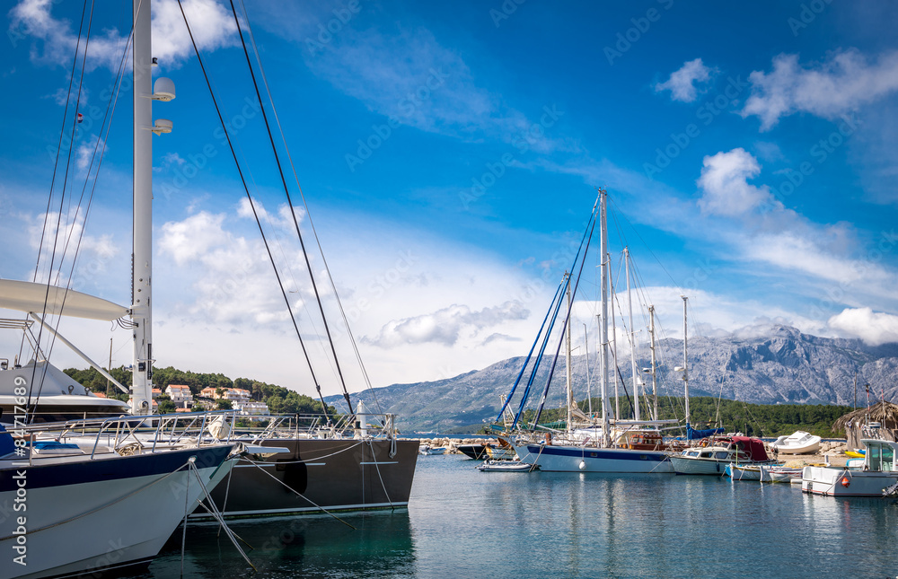 Fototapeta premium Luxury yachts and sailing boats in marina