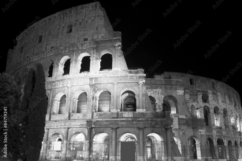 Roman Coliseum at night in Rome, Italy