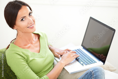Attractive caucasian woman using a laptop