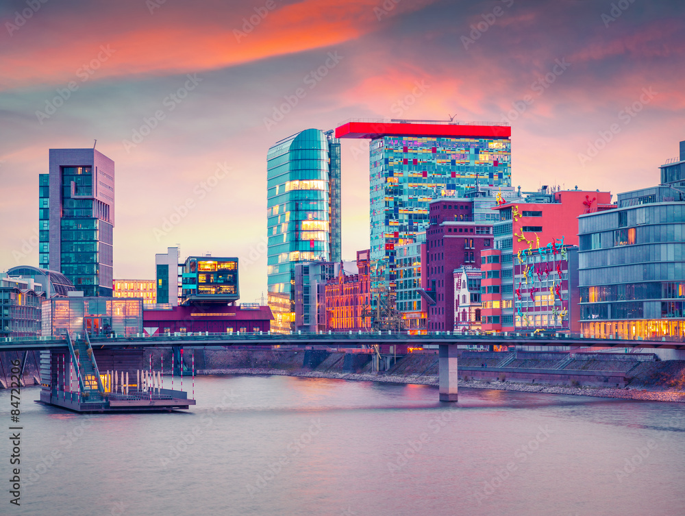 Fototapeta premium Colorful spring sunset on Rhine river in Dusseldorf.
