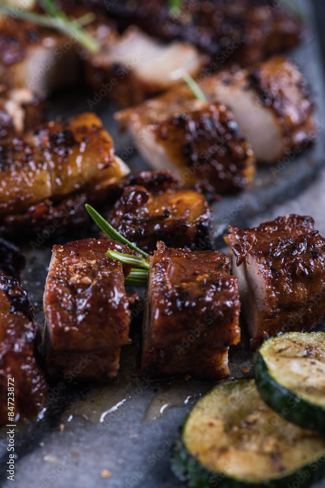 Close view on grilled crispy pork belly with sticky glaze Close view on grilled crispy pork belly with sticky glaze