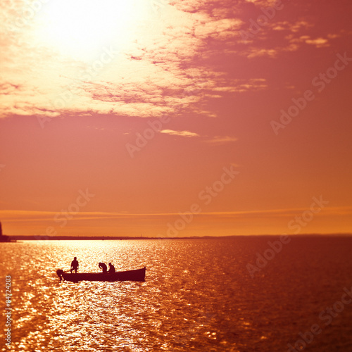 Fishing boat at Sunset in the Ocean
