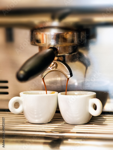 Coffee machine dispensing a double espresso