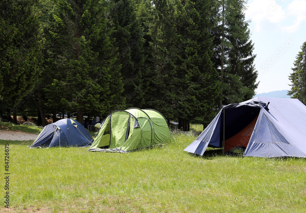 boy scout camp with tents to sleep during the summer camp