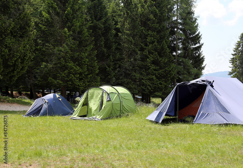 boy scout camp with tents to sleep during the summer camp