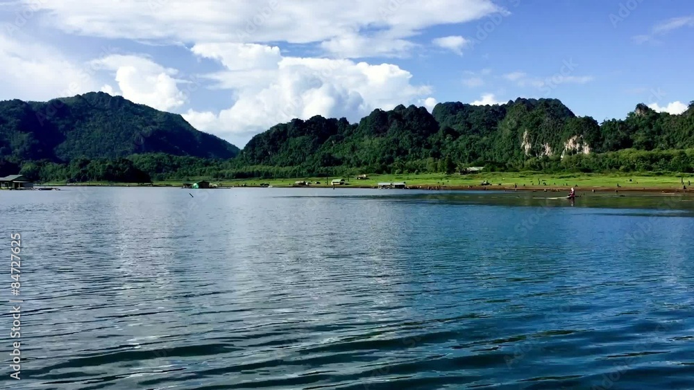 Viewpoint from Long-tail boat and lakeside raft houses on khao laem dam at kanchanaburi, Thailand Viewpoint from Long-tail boat and lakeside raft houses on khao laem dam at kanchanaburi, Thailand
