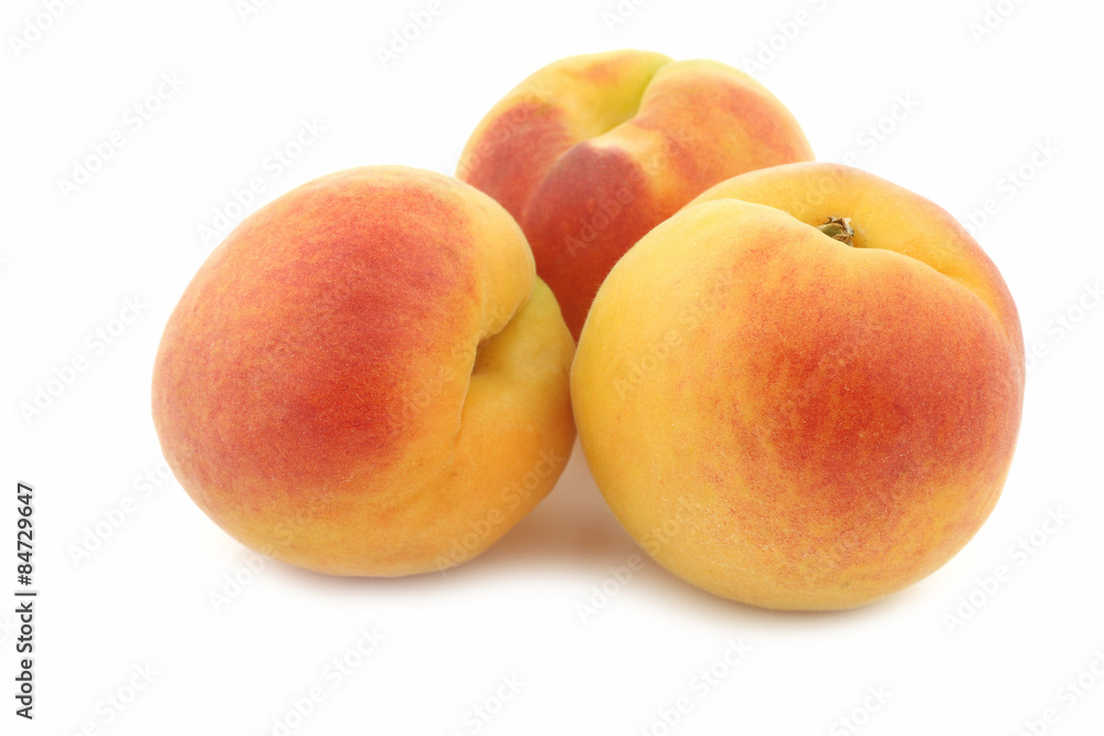 fresh colorful apricots on a white background fresh colorful apricots on a white background