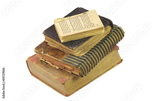 Nearly a century old books, hand bound by a bookbinder and the old scout songbook. On the white background, isolated.