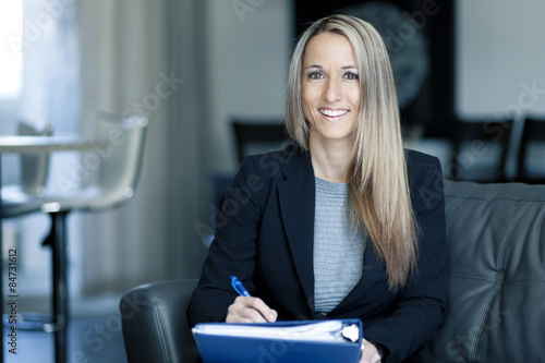 Blond Confident Businesswoman Working At Home