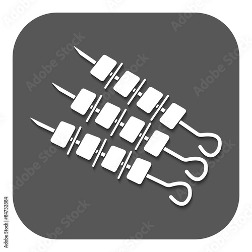 The shashlik icon. Kebab and barbecue symbol. Flat