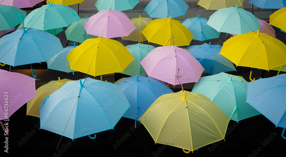 Obraz premium Umbrellas hanged on a lines in umbrella park