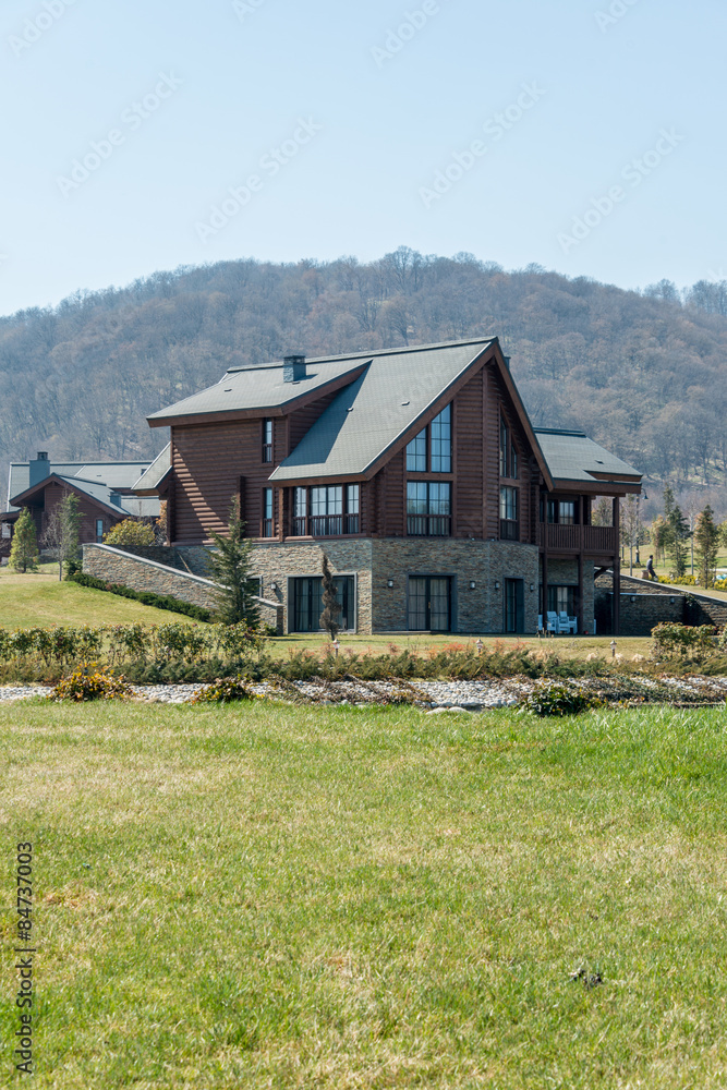 Fototapeta premium Modern house in bright summer day