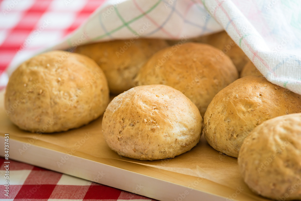 Freshly baked whole wheat rye bread rolls