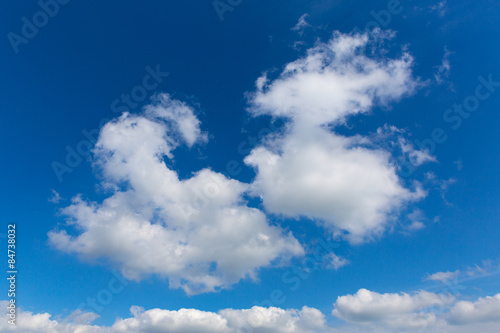 Fototapeta Naklejka Na Ścianę i Meble -  Fluffy white clouds in beautiful blue sky in spring