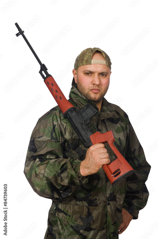 Young man in soldier uniform holding gun isolated on white Young man in soldier uniform holding gun isolated on white