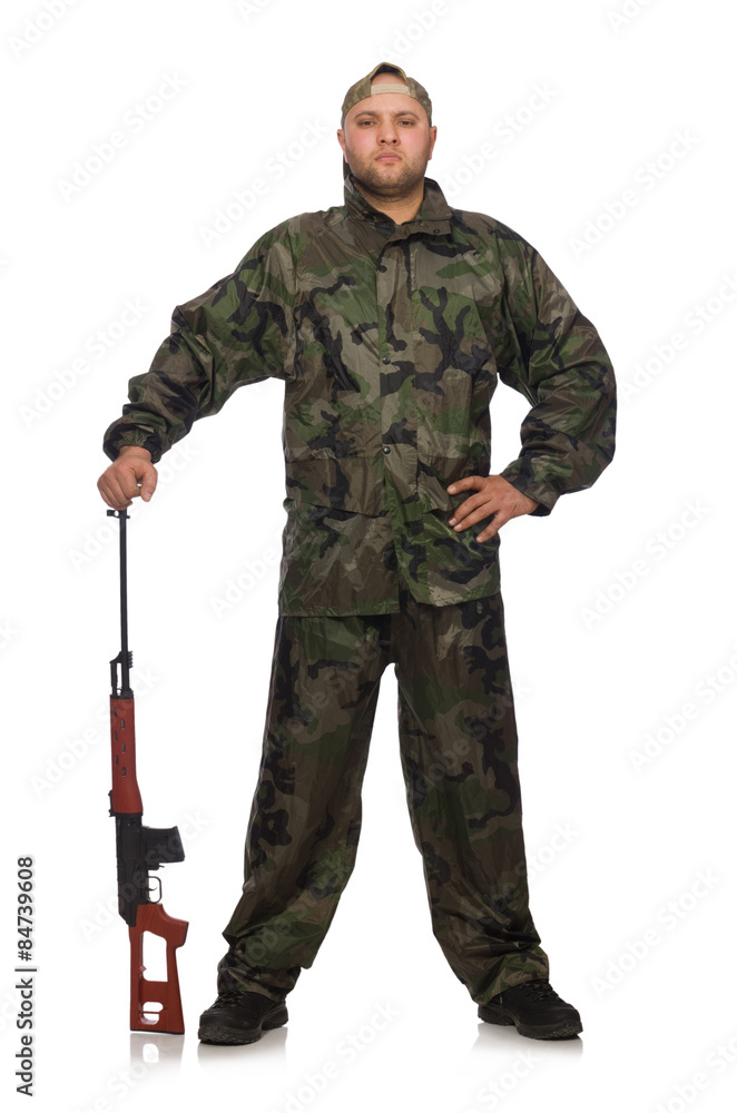 Young man in soldier uniform holding gun isolated on white Young man in soldier uniform holding gun isolated on white
