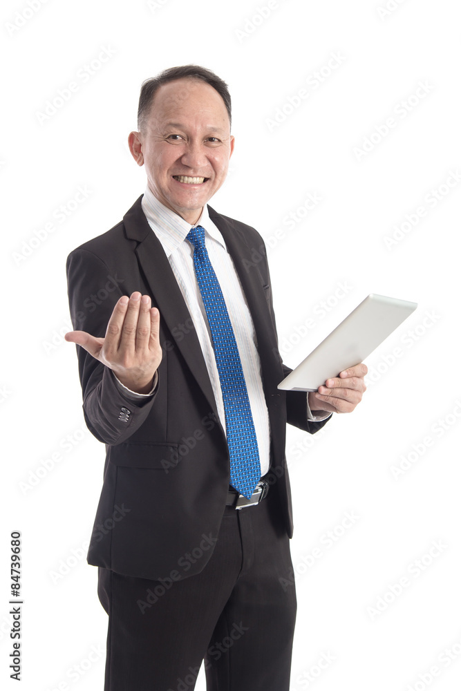 Portrait of a mature businessman with digital tablet on white ba