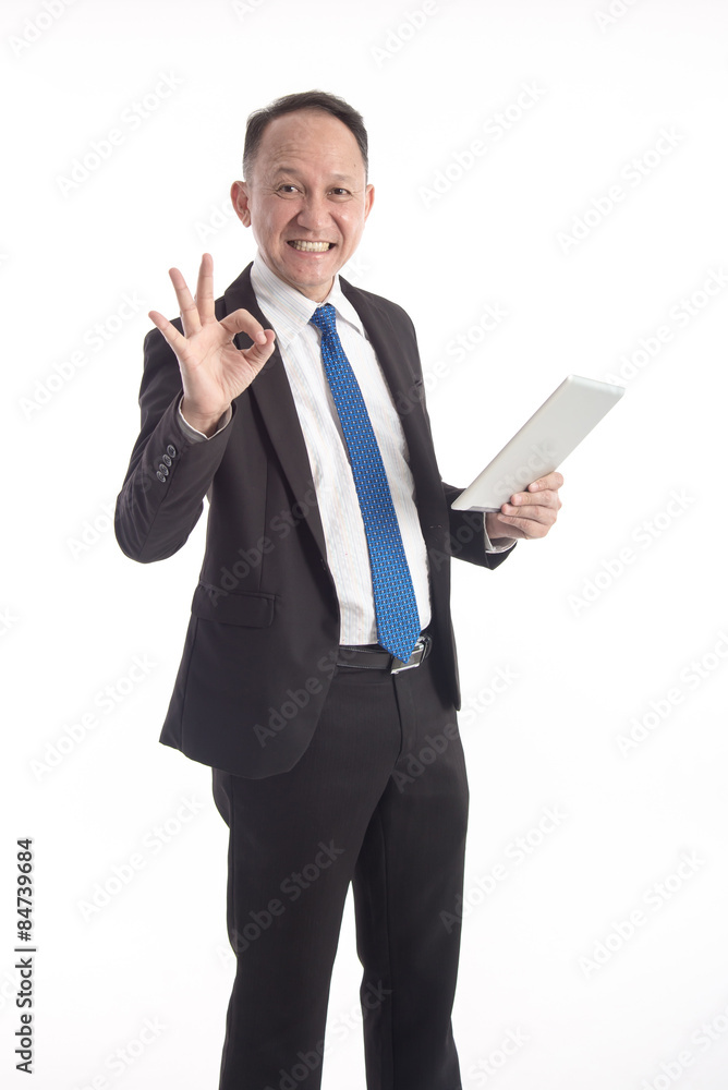 Portrait of a mature businessman with digital tablet on white ba Portrait of a mature businessman with digital tablet on white ba