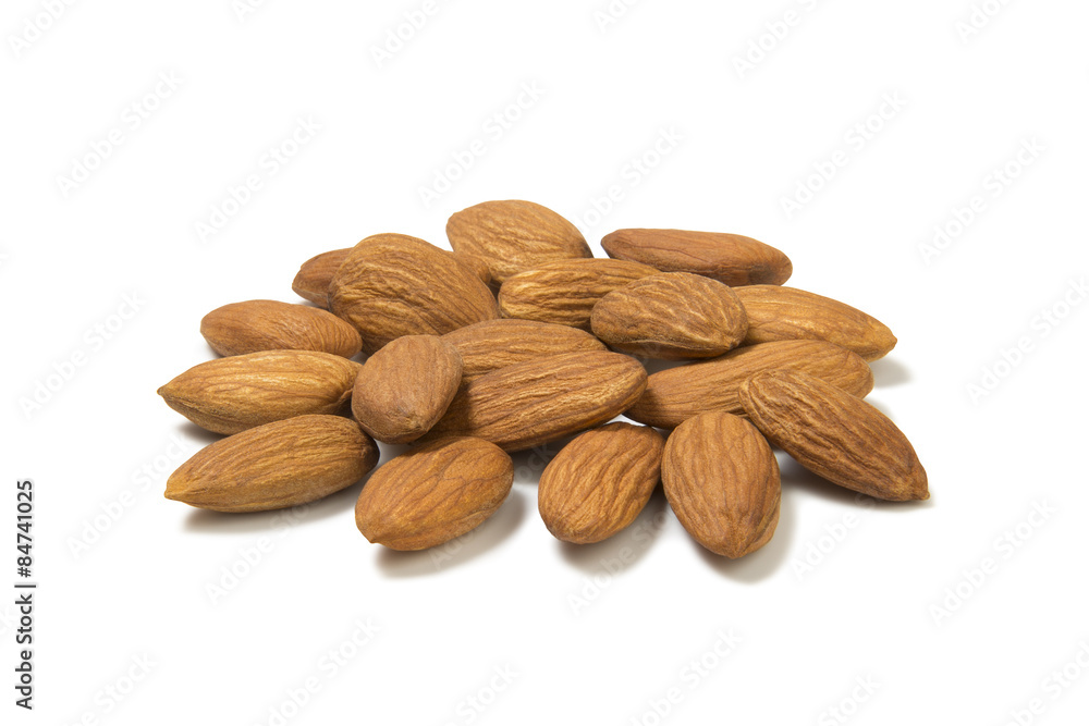 heap of peeled almond nuts isolated on white heap of peeled almond nuts isolated on white