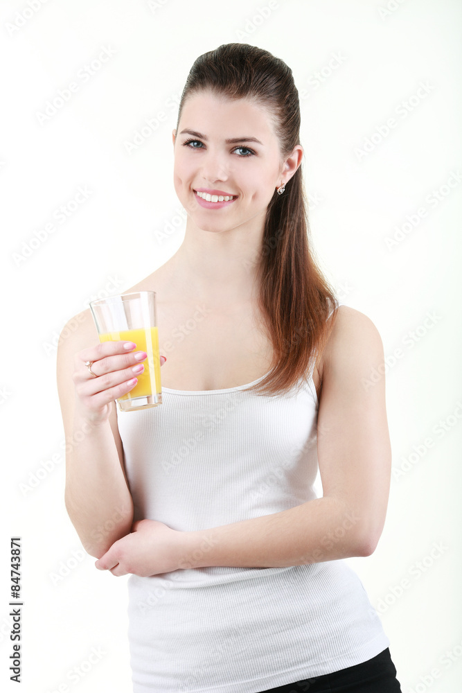 Beautiful woman with a glass of orange juice, isolated on white
Beautiful woman with a glass of orange juice, isolated on white