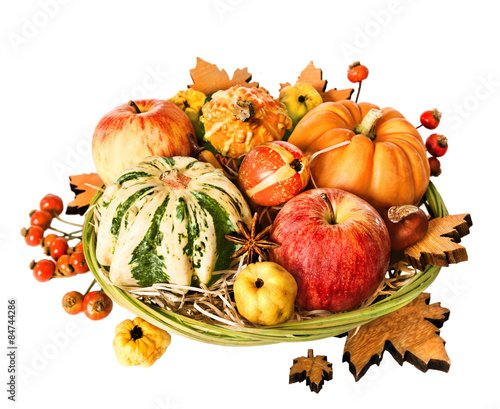 Composition with Autumn leaves  pumpkins and berries