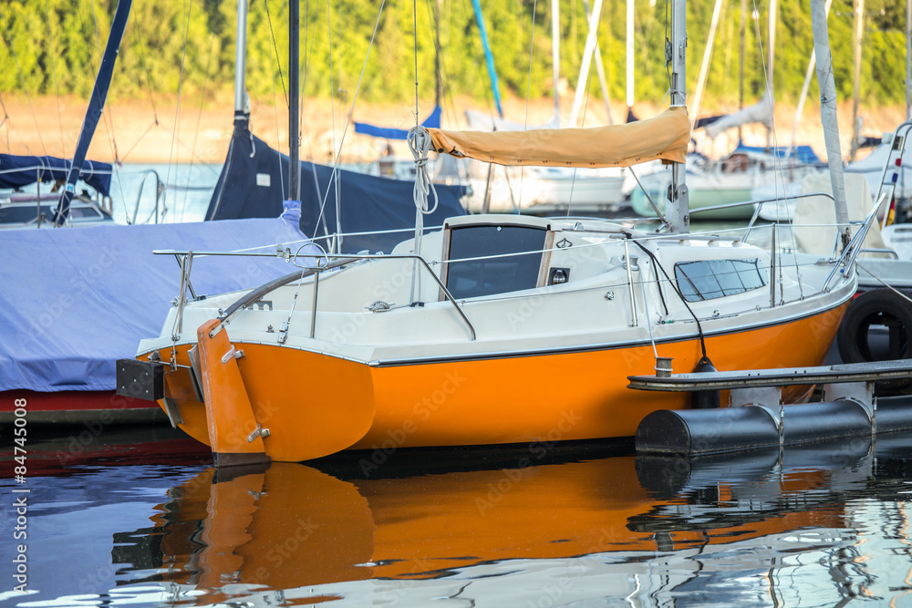 Fototapeta premium sport boat harbor on a lake