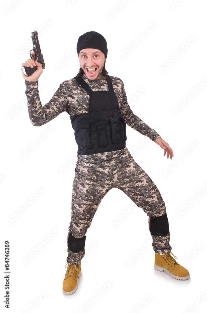 Young man in military uniform holding gun isolated on white Young man in military uniform holding gun isolated on white
