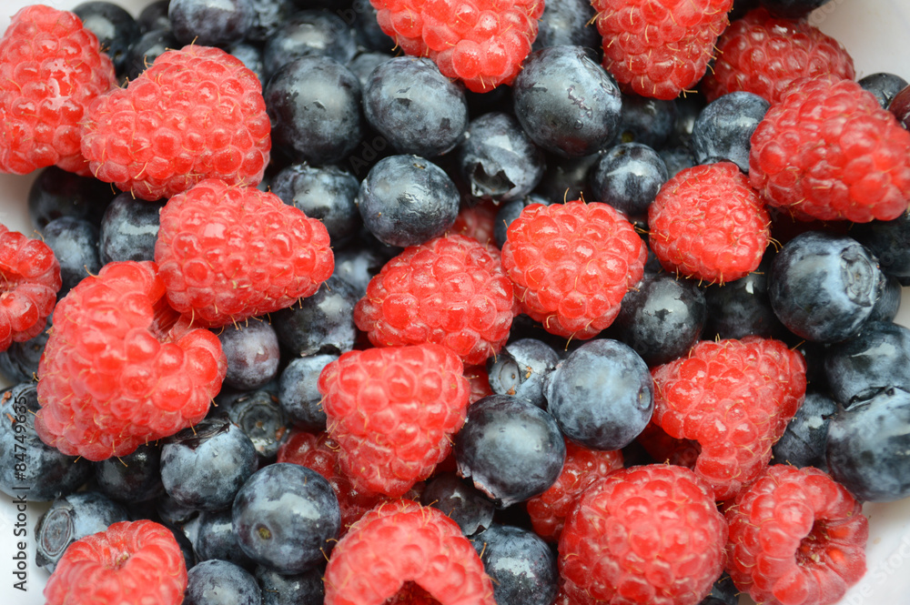 Raspberry and blueberry background Raspberry and blueberry background