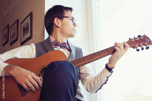 man with guitar photo