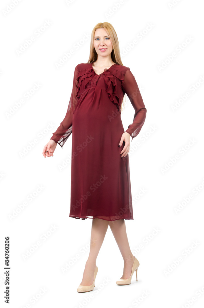 Pretty pregnant woman in red dress isolated on white