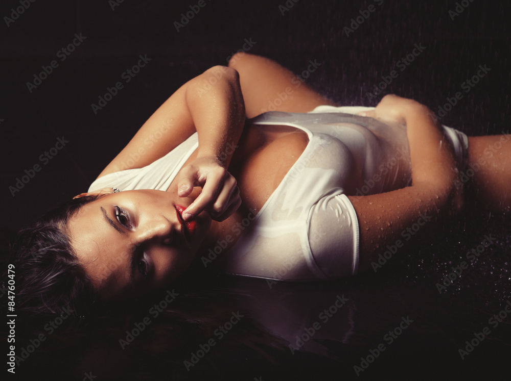 young sexy woman in water studio young sexy woman in water studio