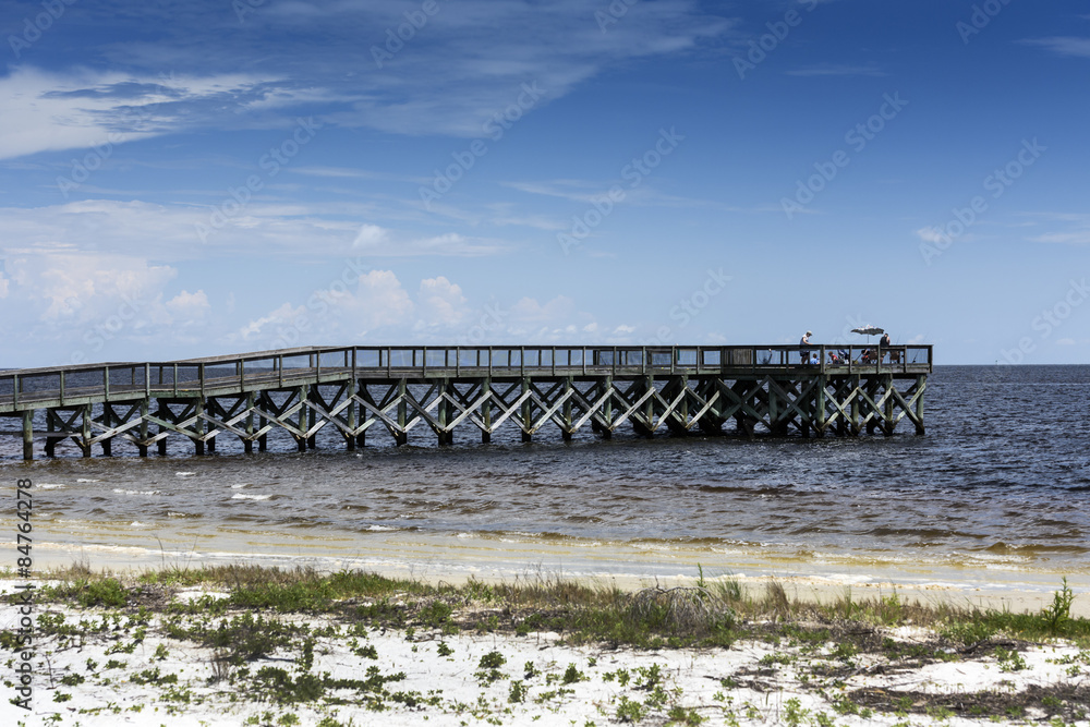 Family Fishing on a Pier