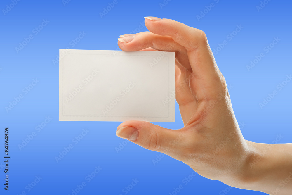 Blank card in female hand Blank card in female hand