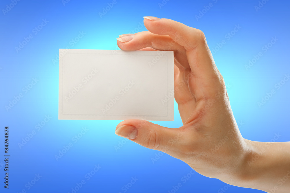 Obraz premium Blank card in female hand