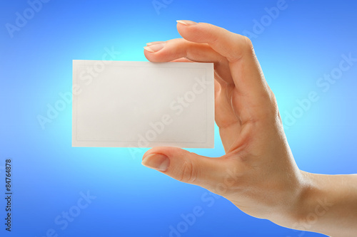 Blank card in female hand