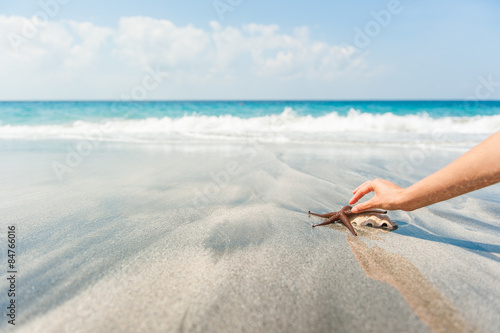 Hand with starfish