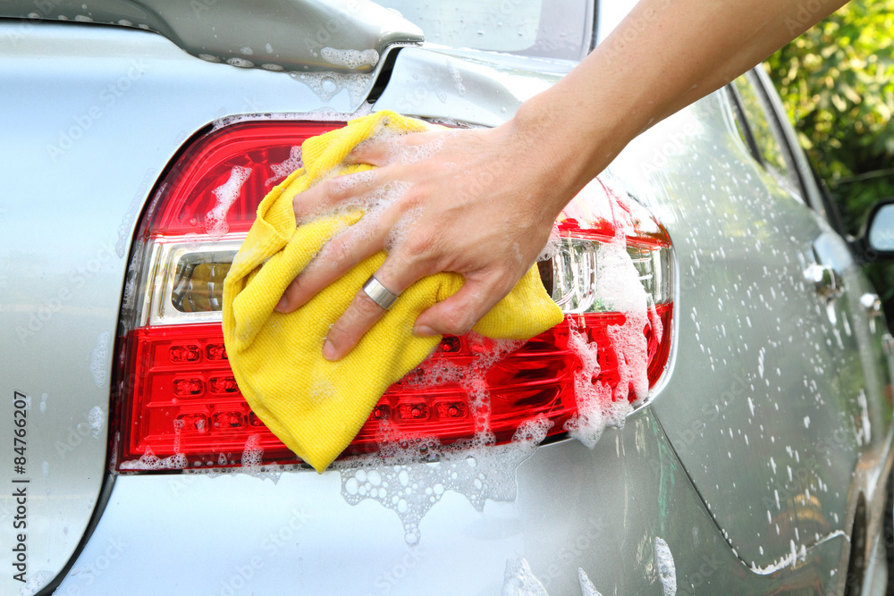 wash the tail light / car wash Stock Photo Adobe Stock