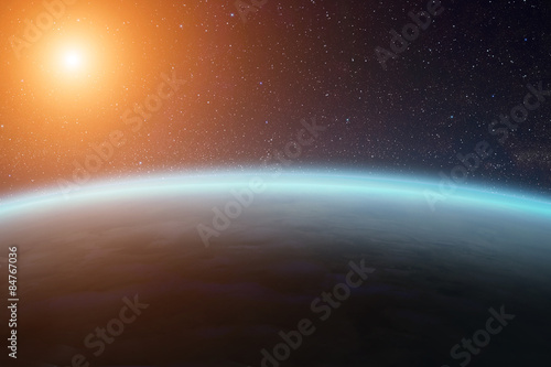Sunrise over planet Earth in space