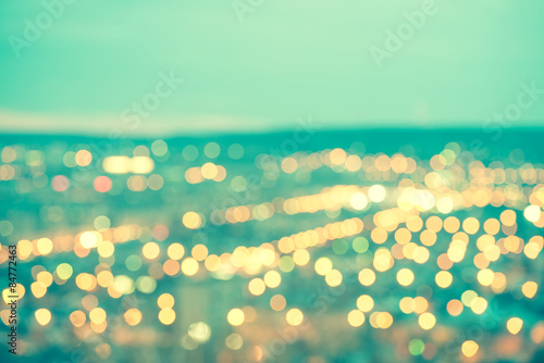 Billede på lærred abstract blue circular bokeh background, city lights with horizo