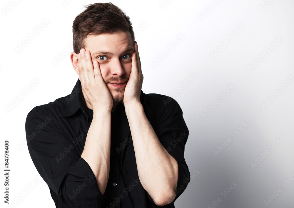 Casual young man looking at camera Casual young man looking at camera