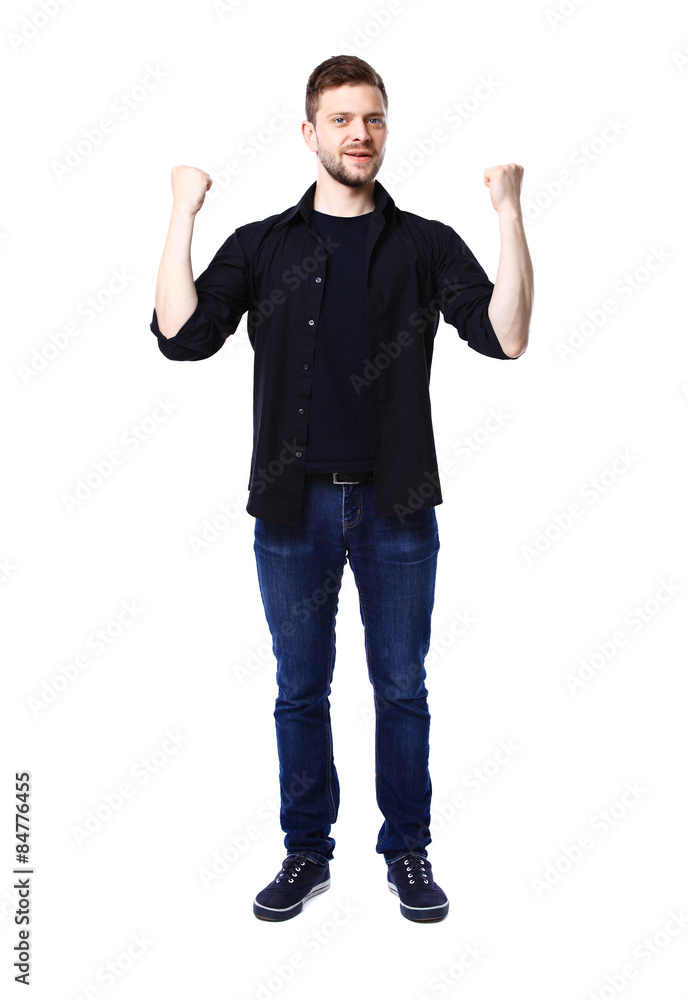 Excited handsome man with arms raised in success - Isolated on w Excited handsome man with arms raised in success - Isolated on w