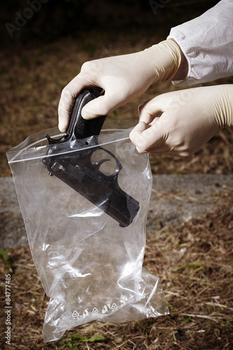 Crime scene investigation - handgun in park
