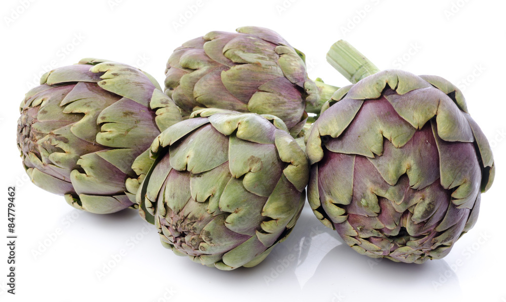 Fototapeta premium Fresh green purple artichokes